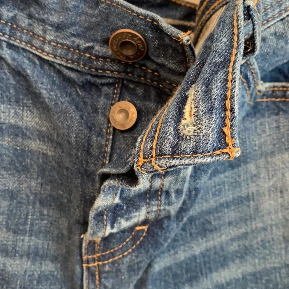 We The Free Regular Low Rise Button Fly Distressed Jeans